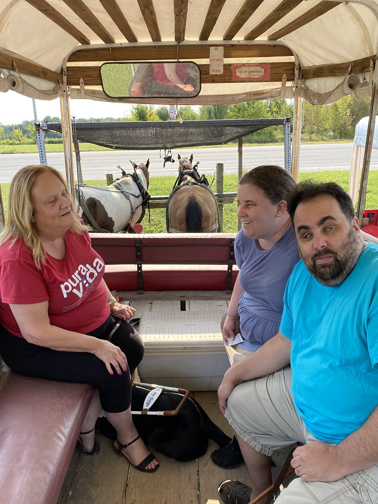 Terry, Ashley and Carlos on the wagon